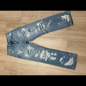 Color: Denim with bleach stains